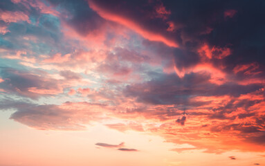 Wall Mural - Gorgeous sunset and soft pink clouds of pastel tones. Image of abstract designs and shapes.