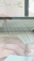 Poster - Animation of hands using laptop over male and female colleague walking in modern building
