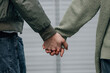© carballo - young couple on the street holding hands