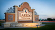 © Nanang - Laredo Welcome Sign At Dusk Featuring Ornate Tilework And Classic Southwestern Design
