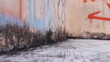 © WAHYU - Close-up view of a graffiti-covered wall with dark mold or mildew at the base.