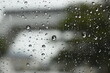 © sutichak - water drop on mirror in rainy day, blur natural background