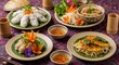 © Li - A table setting displays an array of beautifully presented Vietnamese dishes, showcasing diverse flavors and textures.
