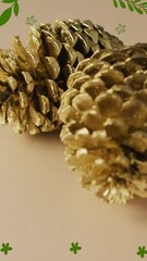 Poster - Animation of autumn leaves over pine cones on brown background