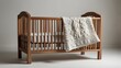 © Dalilah - Wooden baby crib with soft bedding, white background