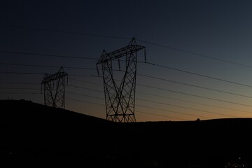 Poster - The evening electricity pylon silhouette