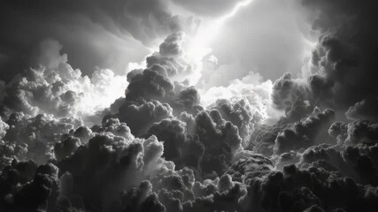 Wall Mural - a dramatic black and white photo of lightning storm clouds with thunderous darkness
