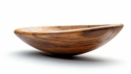 Aufkleber - A simple wooden bowl sits atop a table in a warm and inviting setting