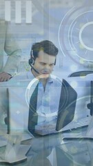 Poster - Animation of data processing over caucasian senior businessman talking to his junior colleagues