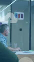 Poster - Animation of cloud upload icons floating against woman giving a presentation at office