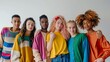 © Usman - Group of young people in colorful clothes with hands on shoulder standing on white background