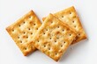 © LimeSky - Isolated dry cracker cookies on a white background Top view of saltines Close up food concept