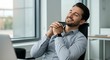 © Roihan - Contented Businessman Relaxing, Smiling, Leaning Back in Modern Office Chair.