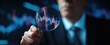 © Marta B - The business professional analyzing stock market trends through a magnifying glass.
