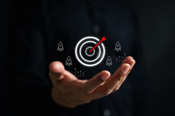 Leinwandbilder - Business goal achievement concept with target and rocket icon mission success, startup growth strategy, innovation planning, and digital marketing vision for entrepreneurs and teams.