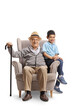 © Ljupco Smokovski - Grandpa and grandson sitting in an armchair