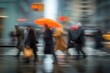 © Pavel - Dynamic movement of commuters in bustling urban intersection during rainy day, showcasing vibrant contrast with orange umbrella among gray surroundings