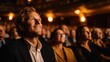© Oleksandr - Captivated audience member smiling in theater setting, evoking wonder and engagement during a live performance or movie screening.