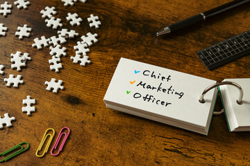 Poster - There is word card with the word Chief Marketing Officer. It is as an eye-catching image.