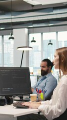 Poster - Vertical video Friendly coworkers helping junior dev code AI algorithms to debug software issues and improve systems, teamwork concept. Welcoming team assisting newcomer in tech startup office, camera