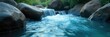 © Outhay - Serene blue water gently flows over smooth stones, creating a calming and tranquil scene perfect for relaxation Ideal for spa, wellness, and meditation themes , therapy, nature, stream
