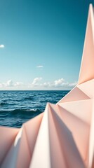 Poster - Geometric structure contrasts with the expansive ocean and azure sky
