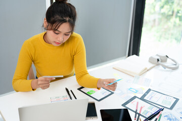 Fototapete - Female ux developer and ui designer , mobile app interface wireframe design. App developer working about screen display prototype layout for smartphone, ui, ux concept.