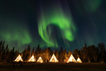 Northern Lights, Aurora Borealis over Teepee and Forest, Yellowknife, Northwest Territories, Canada