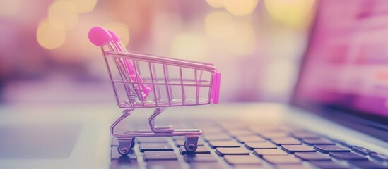 Poster - Miniature Shopping Cart on Laptop Keyboard: E-commerce Concept