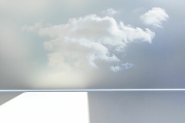 Poster - White cloud is being projected in flat design across grey wall with light patch on floor