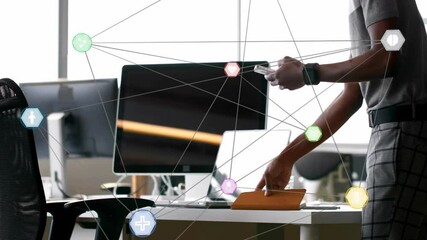 Aufkleber - Office worker tapping smartphone and lifting tablet in workspace, animating network linking devices