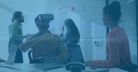 Poster - Mid adult man putting on VR headset initiating demo while colleague guiding controls with waveform