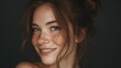 © EMA - Freckled woman's joyful smile