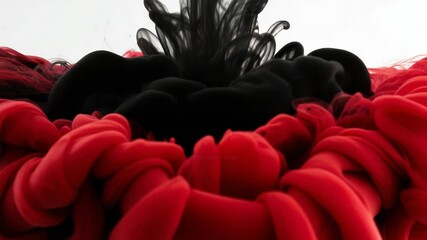 Poster - Red and black ink swirls together in water, creating an abstract and dynamic cloud