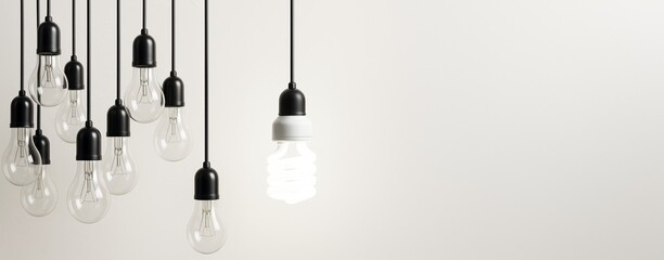 Aufkleber - Hanging lightbulbs with one bright energy-saving bulb on minimal white background for technology or innovation concept mockup banner template.
