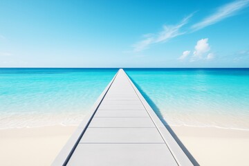 Poster - Long white pier stretching into turquoise ocean under clear blue sky with light clouds, seamless horizon travel concept background scene.