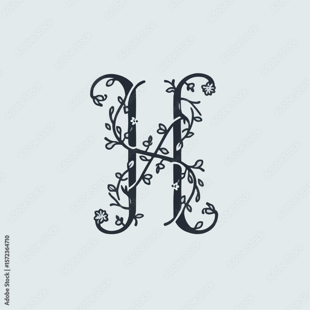Elegant black and white decorative letter 'H' entwined with floral vines for artistic expression
