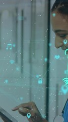 Poster - Animation of network of connections with icons over smiling female doctor using tablet