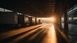 © Isolated studio - Sunset Light Casting Long Shadows Inside Warehouse Logis Area