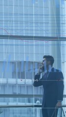 Poster - Animation of financial data processing over diverse business people in office