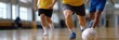 © Iryna - Indoor soccer match with young male players in action