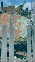 Poster - Animation of multiple graphs over piled up metal scrap in scrapyard