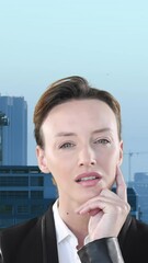 Poster - Composite view of thoughtful caucasian businesswoman against aerial view of tall buildings