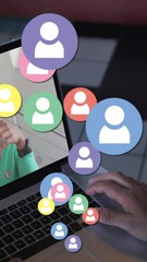 Poster - Animation of profile icons floating against rear view of man having a video call on laptop