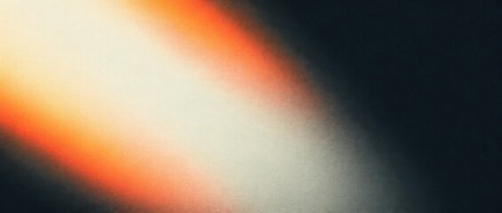 Poster - Abstract light gradient with orange and white hues against a dark background creating a soft glow