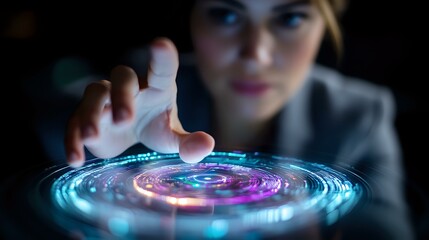 Poster - Young businesswoman interacting with glowing holographic circular interface display showing futuristic technology visualization in dark office setting.