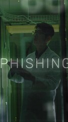 Poster - Animation of phishing text over data processing asian male worker in server room