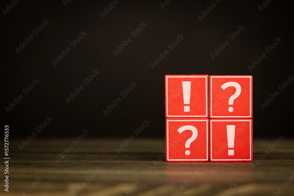 Red blocks are stacked in a grid each with a white question mark and an ...