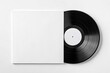 © Vector Design - Vinyl record with blank white cover mockup. Front-facing view of classic black vinyl partially inside a plain sleeve, isolated on white background. Ideal for music branding and design.