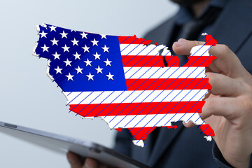 Poster - Image of a businessman holding a digital US map, representing growth and opportunity.